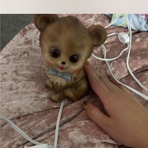 Adorable Brown Bear Figurine with Blue Bow